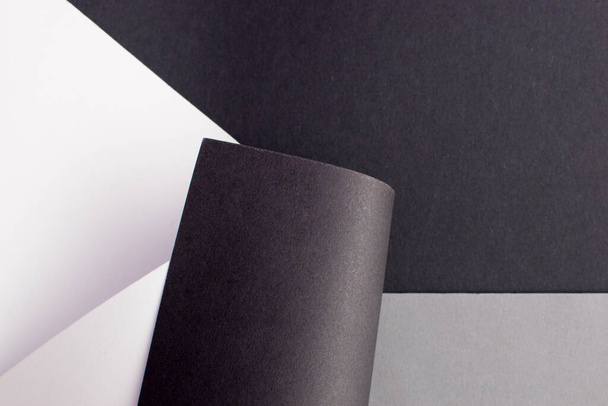 Fondo negro, blanco y gris curvado abstracto - Foto, Imagen