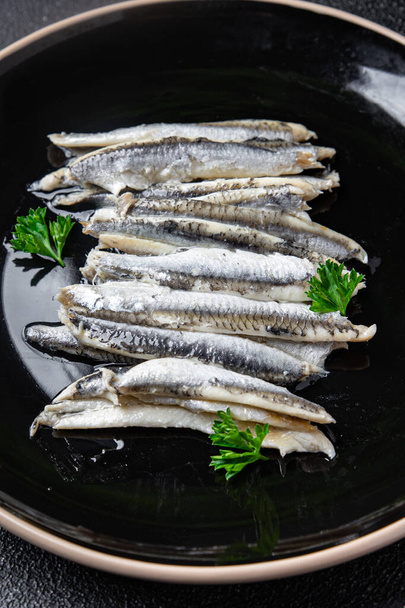 anchois sardine poisson filet fruits de mer repas nourriture sur la table copier espace nourriture fond haut - Photo, image