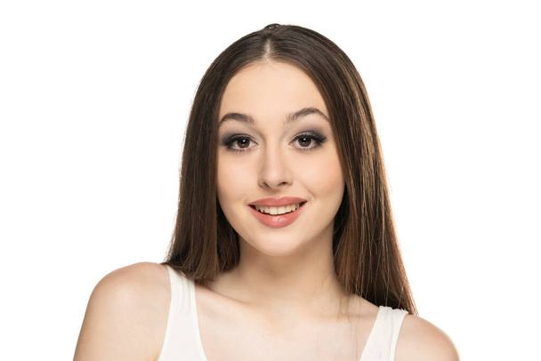 beautiful young smiling women with makeup on a white background. - Photo, Image