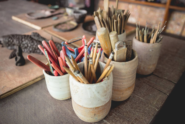 Instruments kit in a large workshop for the manufacture of clay products. - 写真・画像