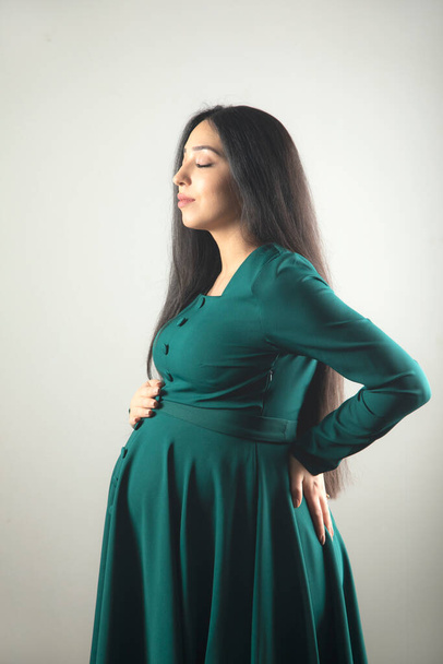 Pregnant woman hand on the belly. - Valokuva, kuva