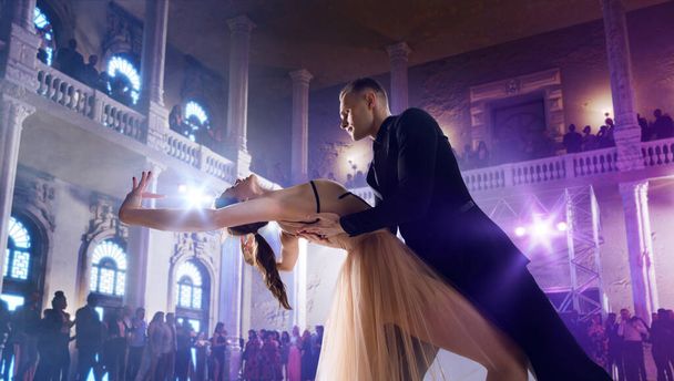 Couple dancers perform waltz on large professional stage. Ballro - Photo, Image