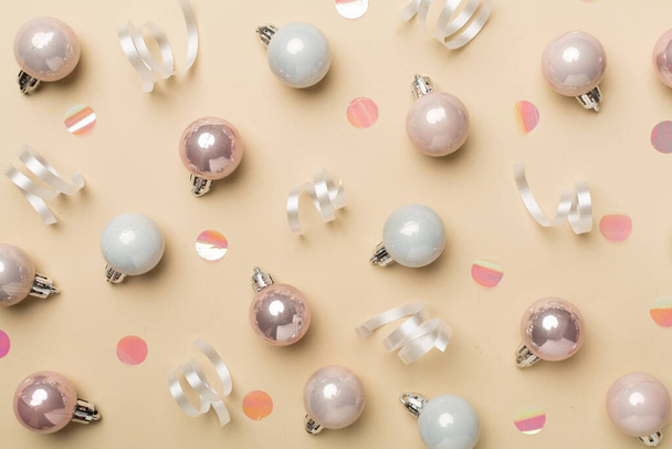 Christmas balls on color background, top view. - Valokuva, kuva