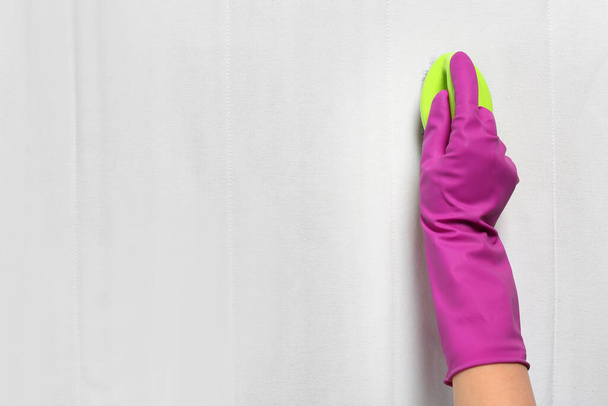 Woman in purple gloves cleaning white mattress with brush, top view. Space for text - Fotografie, Obrázek