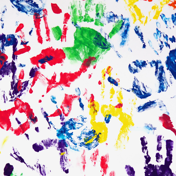 colorful handprints on the white background - Фото, изображение