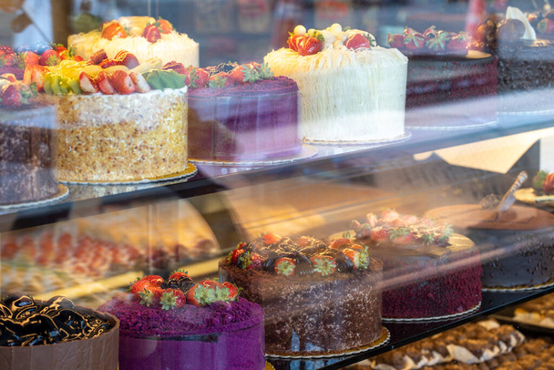 Types of cakes. Cakes displayed on the counter. Bakery products - Photo, Image