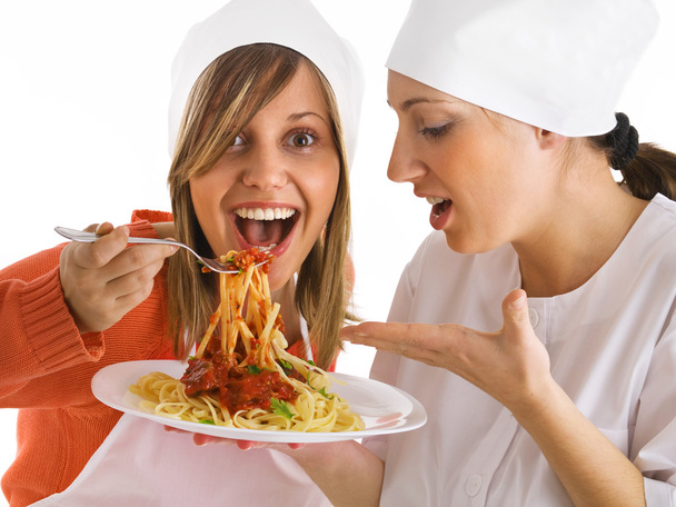 Chefs with spaghetti bolognese - Photo, Image