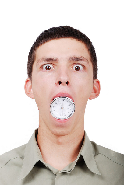 Young man with a watch in his mouth - Foto, Bild
