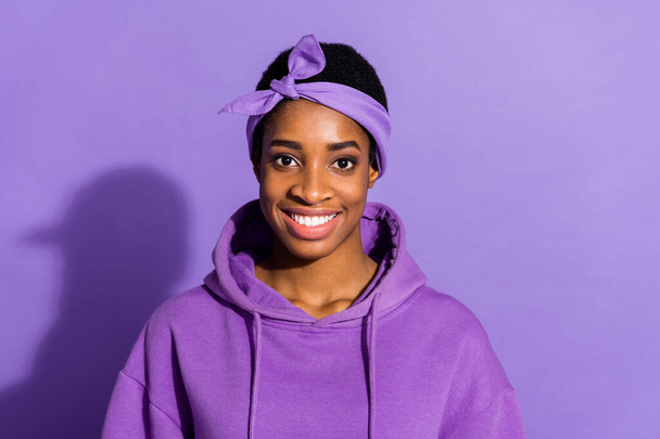 Photo of cheerful pretty transgender look camera beaming smile wear headband sweatshirt isolated purple color background. - Zdjęcie, obraz