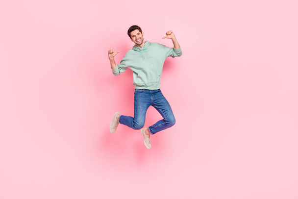 Full length photo of overjoyed cool active person wear trendy grey outfit two arm point himself champion isolated on pink color background. - 写真・画像