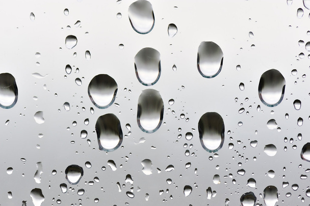 Natural big water drops on window glass - Foto, afbeelding