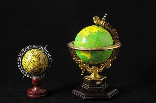 Globes of Planet Earth on a Black Background - Photo, Image