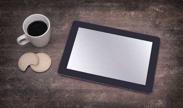 Tabletti touch tietokone gadget puinen pöytä
 - Valokuva, kuva