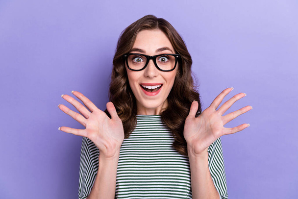 Closeup photo of young girlish lady hands up shopaholic big clothes sale toothy smile wear stylish glasses isolated on pastel purple color background. - Φωτογραφία, εικόνα