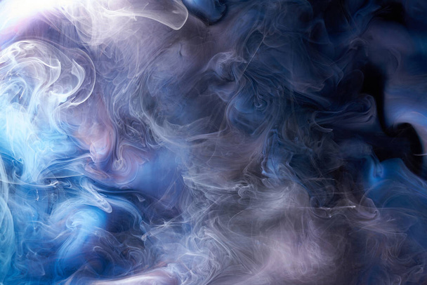 Blue ink abstract background. Acrylic paint backdrop for perfume, hookah, cosmetics. Mysterious smoke clouds, colorful fog - Fotografie, Obrázek