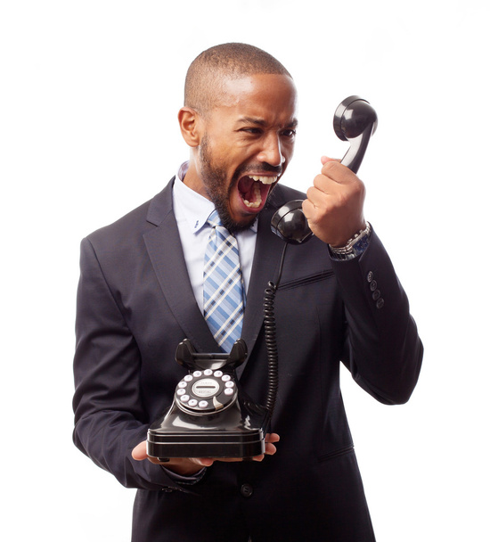 Young cool black man shouting at phone - Fotó, kép