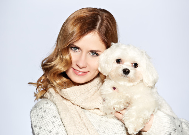 beautiful young woman and a sweet little white dog - Fotoğraf, Görsel