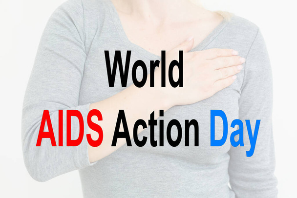 fita vermelha. Sinal de sensibilização para a SIDA. Símbolo do Dia Mundial do VIH - Foto, Imagem