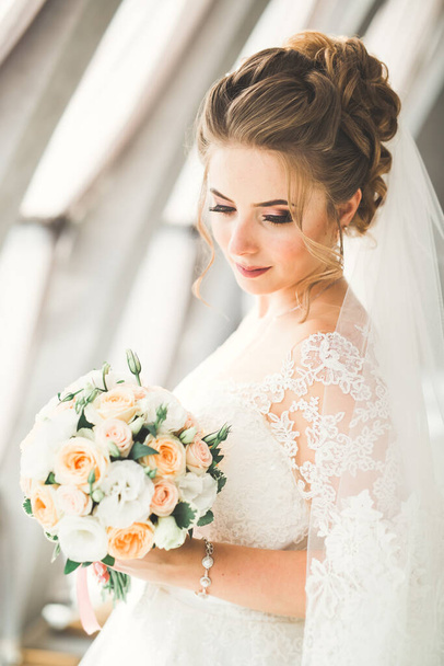 Beautiful luxury bride in elegant white dress. - Photo, Image