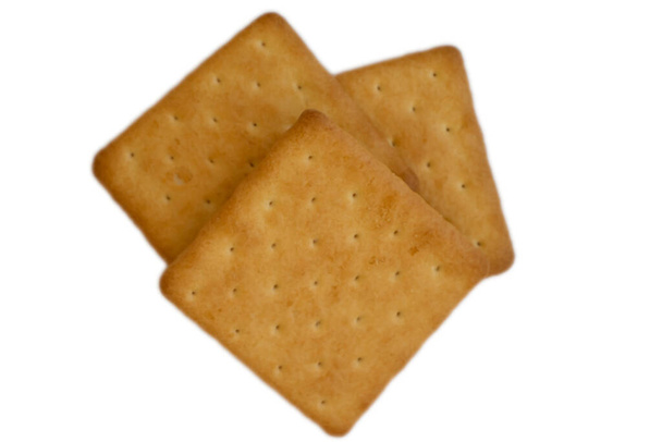 salzige Kekse isoliert auf weißem Hintergrund - Foto, Bild