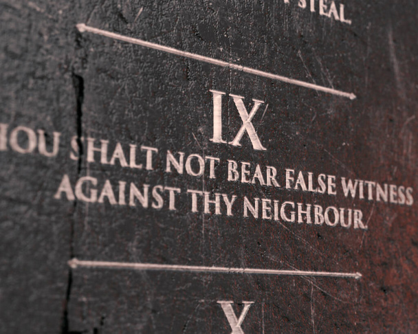 A view of the ninth commandment etched into a cracked stone tablet on an isolated background - 3D render - Photo, Image