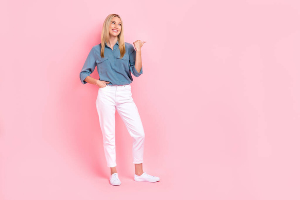 Full size portrait of pretty positive girl look direct thumb finger empty space isolated on pink color background. - Φωτογραφία, εικόνα