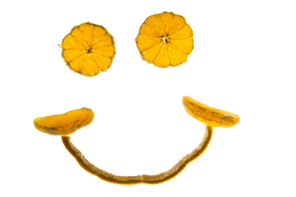 mosolygó arc készült narancs szelet - Fotó, kép