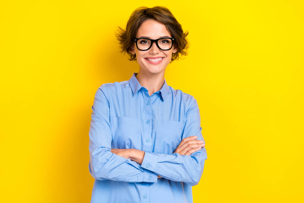 Portrait photo of young attractive optimistic employer girl wear glasses student first job confident toothy smile professional isolated on yelow color background. - Foto, Bild