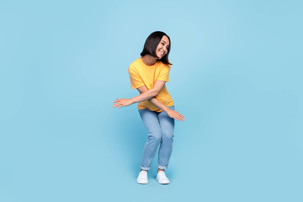 Full body size photo of young excited positive dancing girl celebrate party discotheque crossed hands pose holidays isolated on bright blue color background. - Fotoğraf, Görsel