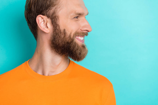Profile photo of funny beard guy look promotion wear orange t-shirt isolated on teal color backgroiund. - Foto, imagen