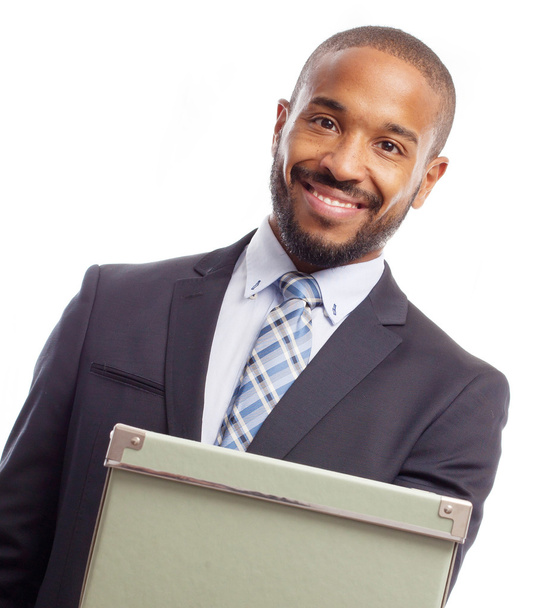 Young cool black man offering a box - Photo, image