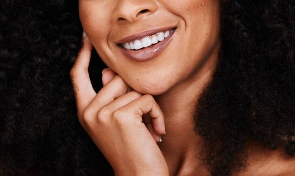 Skincare, dental and teeth smile, healthcare and black woman with wellness, lips cosmetic and natural. Female model, beauty and white tooth, happy face with cosmetics, mouth hygiene and lips makeup. - Foto, Imagem