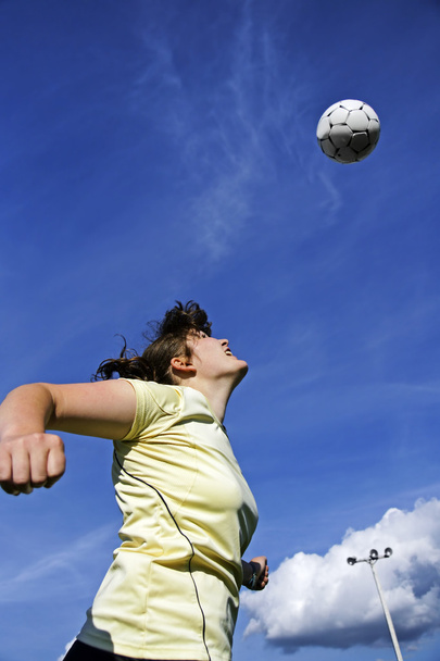 Woman soccer or football player header - Фото, зображення