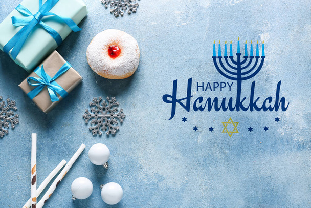 Greeting card with sufganiya for Hanukkah, gifts and Christmas decor - Photo, Image