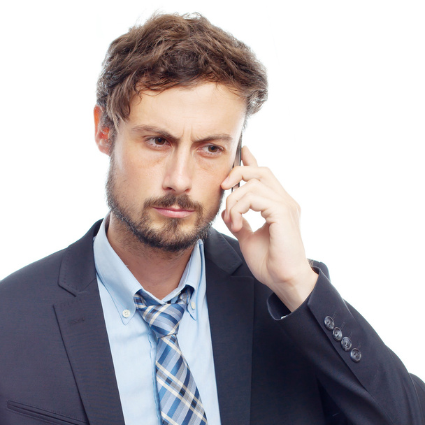 young crazy businessman speaking on phone - Zdjęcie, obraz