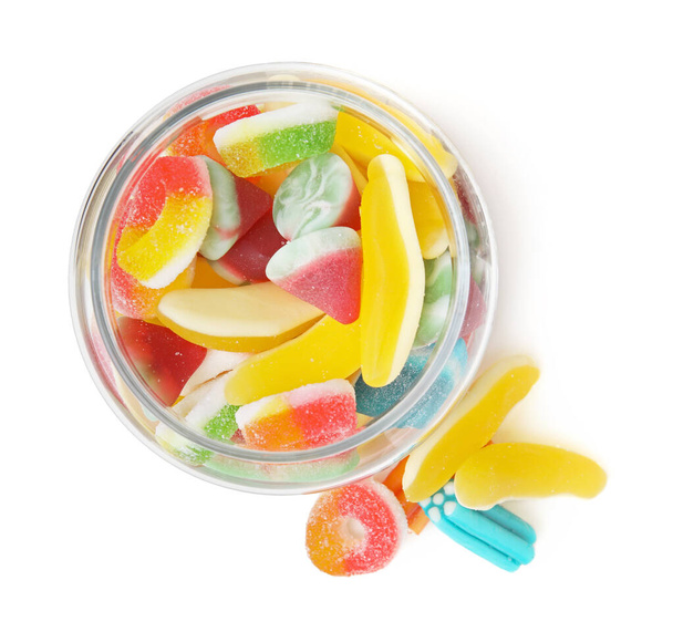Tasty jelly candies in jar on white background, top view - Fotografie, Obrázek