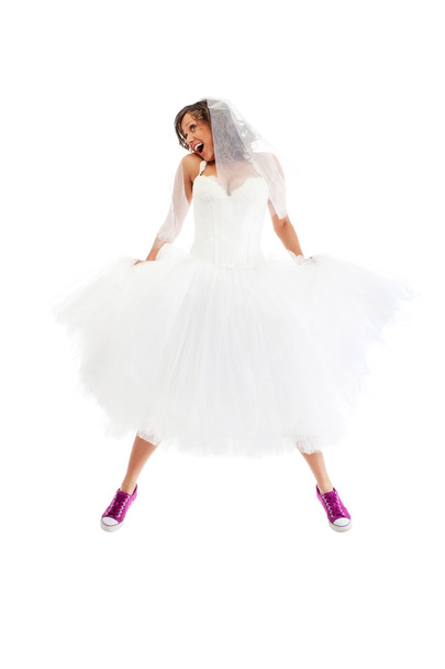 Jumping bride wearing sneakers - Foto, afbeelding