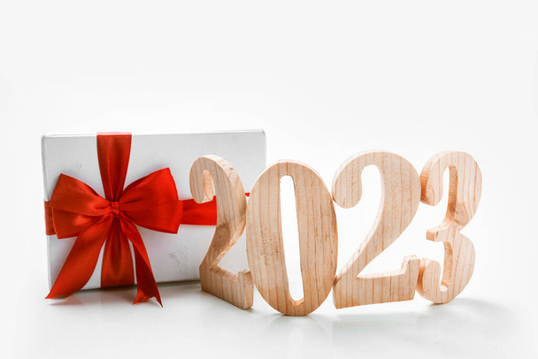 2023 with a gift box with a white background. Happy New Year 2023 - Valokuva, kuva