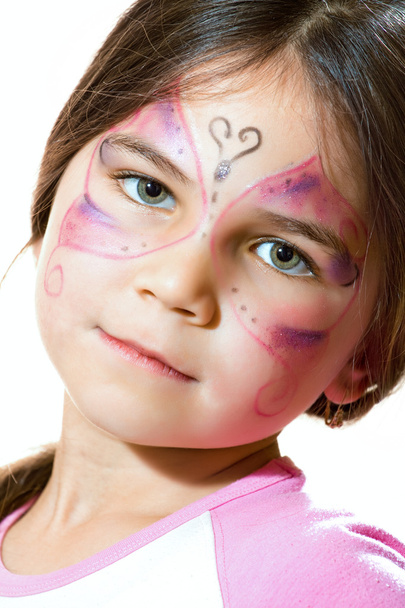 Beautiful young girl with face painted - Foto, Bild