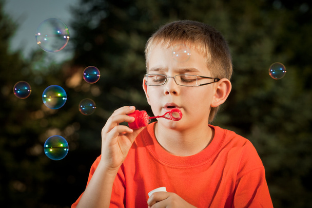 Boy with soap bubbles - Photo, Image