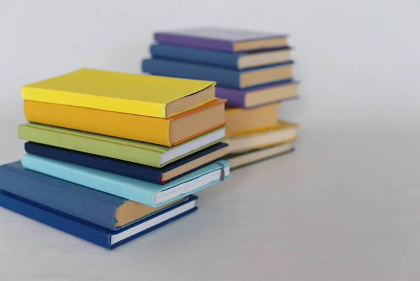 A pile of books for school on a white background - Фото, изображение