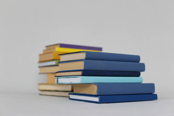 stack of books on a white background. - Φωτογραφία, εικόνα