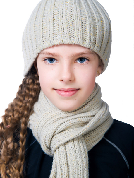Little girl in cap and scarf - 写真・画像