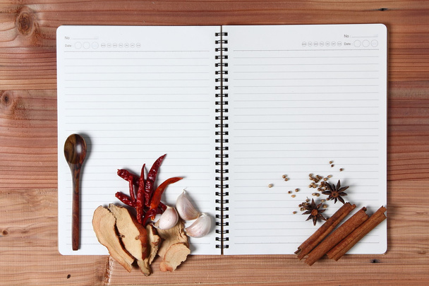 Recipe book with spices - Photo, image