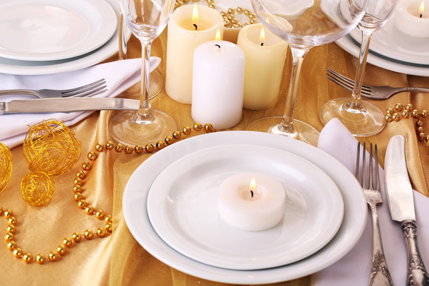 Beautiful holiday table setting in white and gold color  - Valokuva, kuva