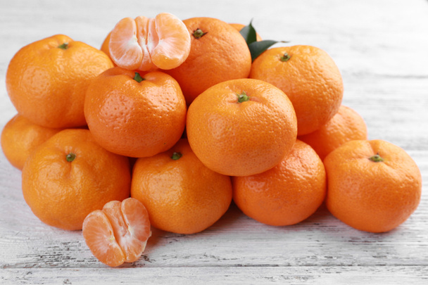 Tangerines on wooden background - Foto, Bild