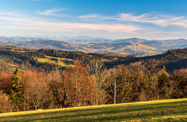 Amazing view to Beskids mountains and Tatra mountains from Cieslar hill in autumn Beskid Slaski mountains on polish - czech borders - Photo, Image