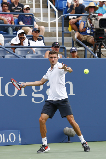 Professional tennis player Gilles Simon from France during round 4 match against US Open 2014 champion Marin Cilic - Photo, Image