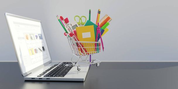 Schulen bieten Online-Shopping und -Verkauf an. Büroschreibwaren in einem Einkaufswagen auf einem Computer-Laptop, Kopierplatz. 3D-Darstellung - Foto, Bild