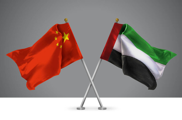 Dos onduladas banderas cruzadas de China y Emiratos Árabes Unidos, signo de relaciones entre China y Emiratos Árabes Unidos - Foto, imagen